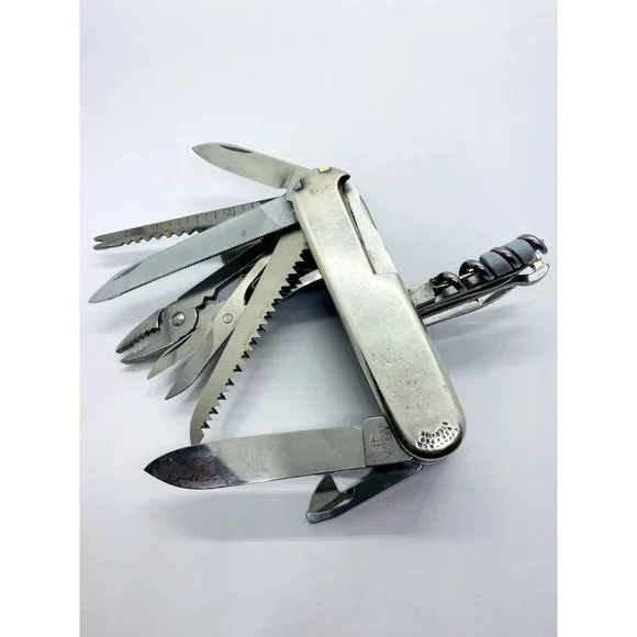 TIFFANY CO STERLING SILVER 18K& BLUE Victorinox Swiss Army Swiss